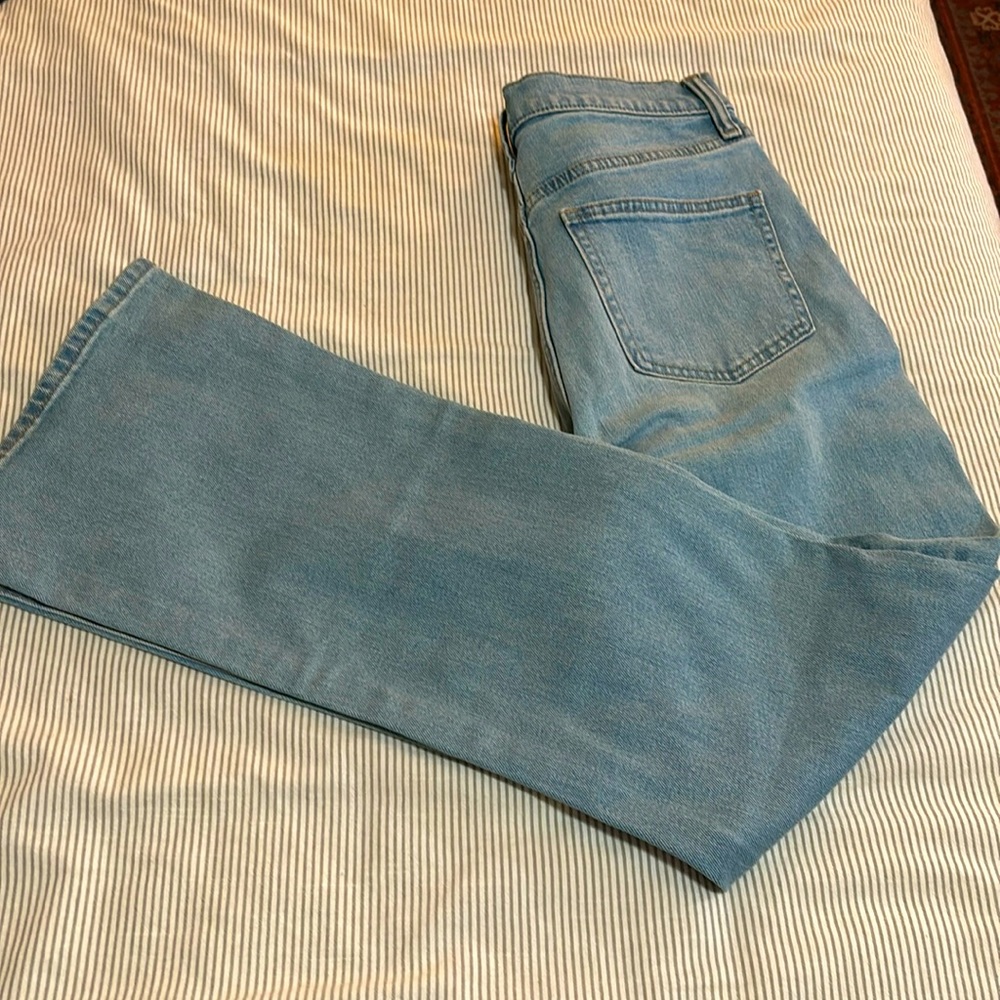 Boot cut light blue Uniqlo jeans, 26 inch waist